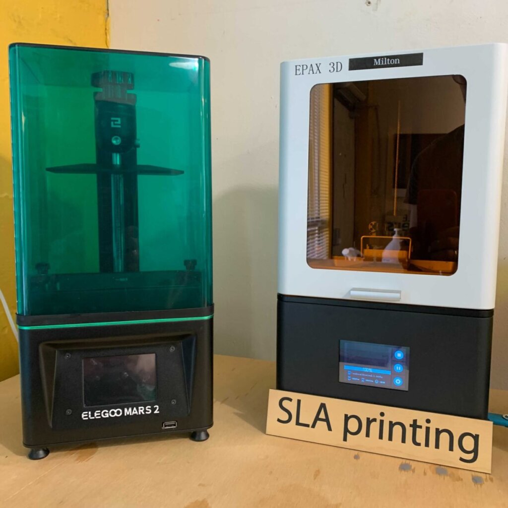 two SLA 3D Printers