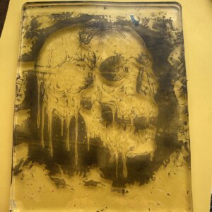 A gel plate with an image of a skull